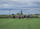 Laatste training S.K.N.W.K. JO11-1JM (partijtje tegen de ouders) van maandag 27 mei 2024 (1/137)